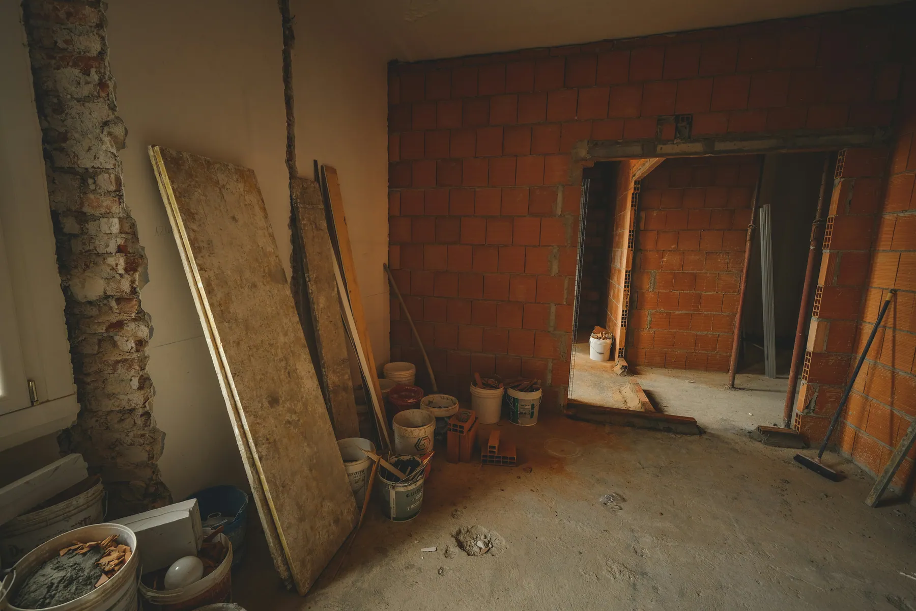 Professional plumber completing a bathroom installation
